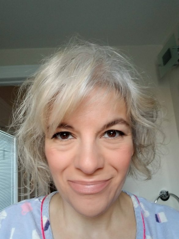 gray hair lady blue shirt