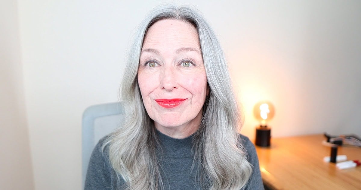 image of woman with grey hair wearing Cover Girl Lit A Fire