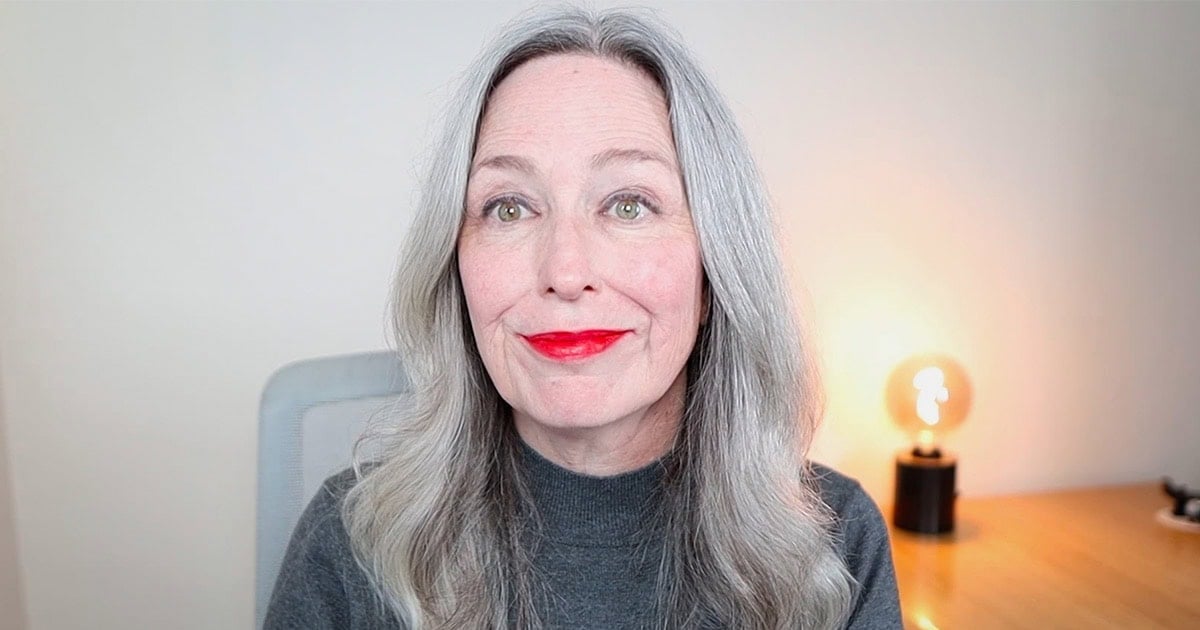 image of woman with n natural gray hair wearing Maybelline 24 in shade 35 Keep It Red