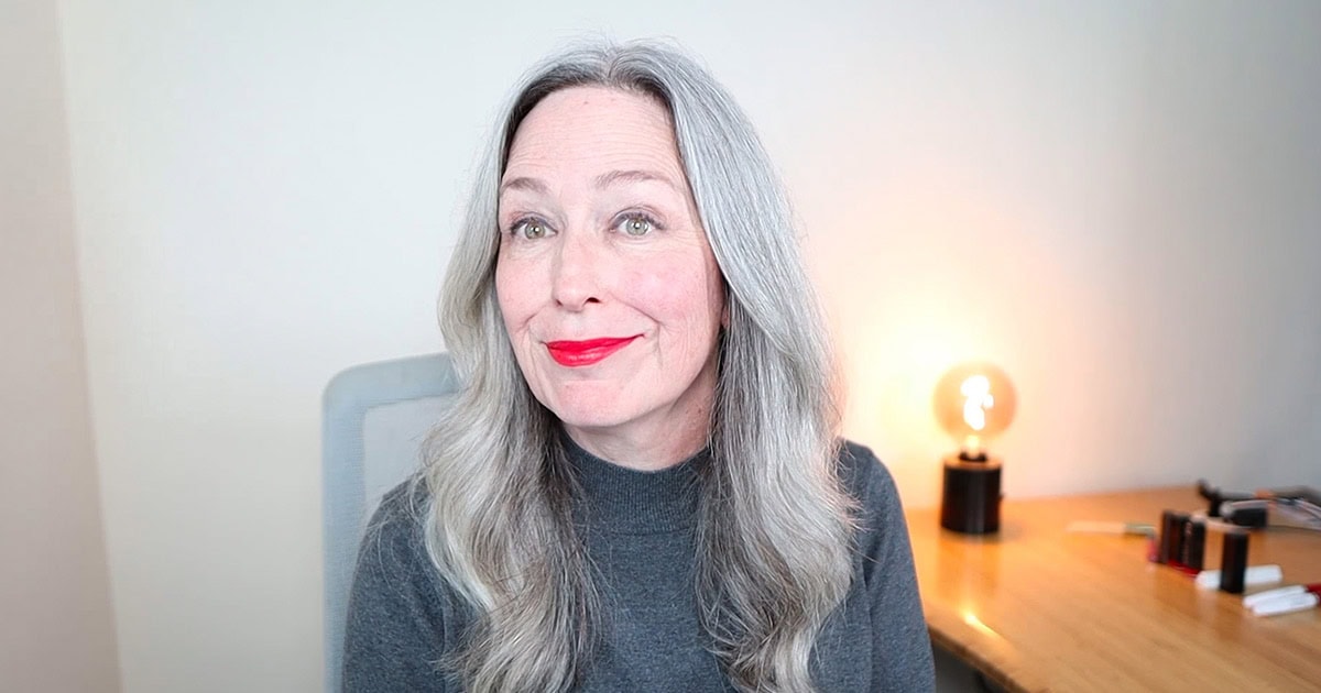 image of woman with gray hair wearing Revlon Love That Red