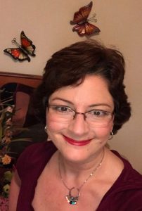 image of pretty woman dark hair glasses