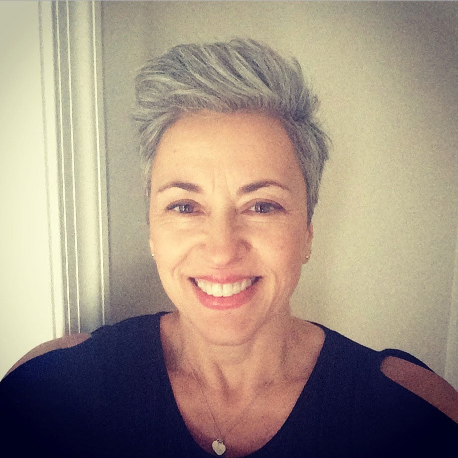 image of woman with a gray pixie cut