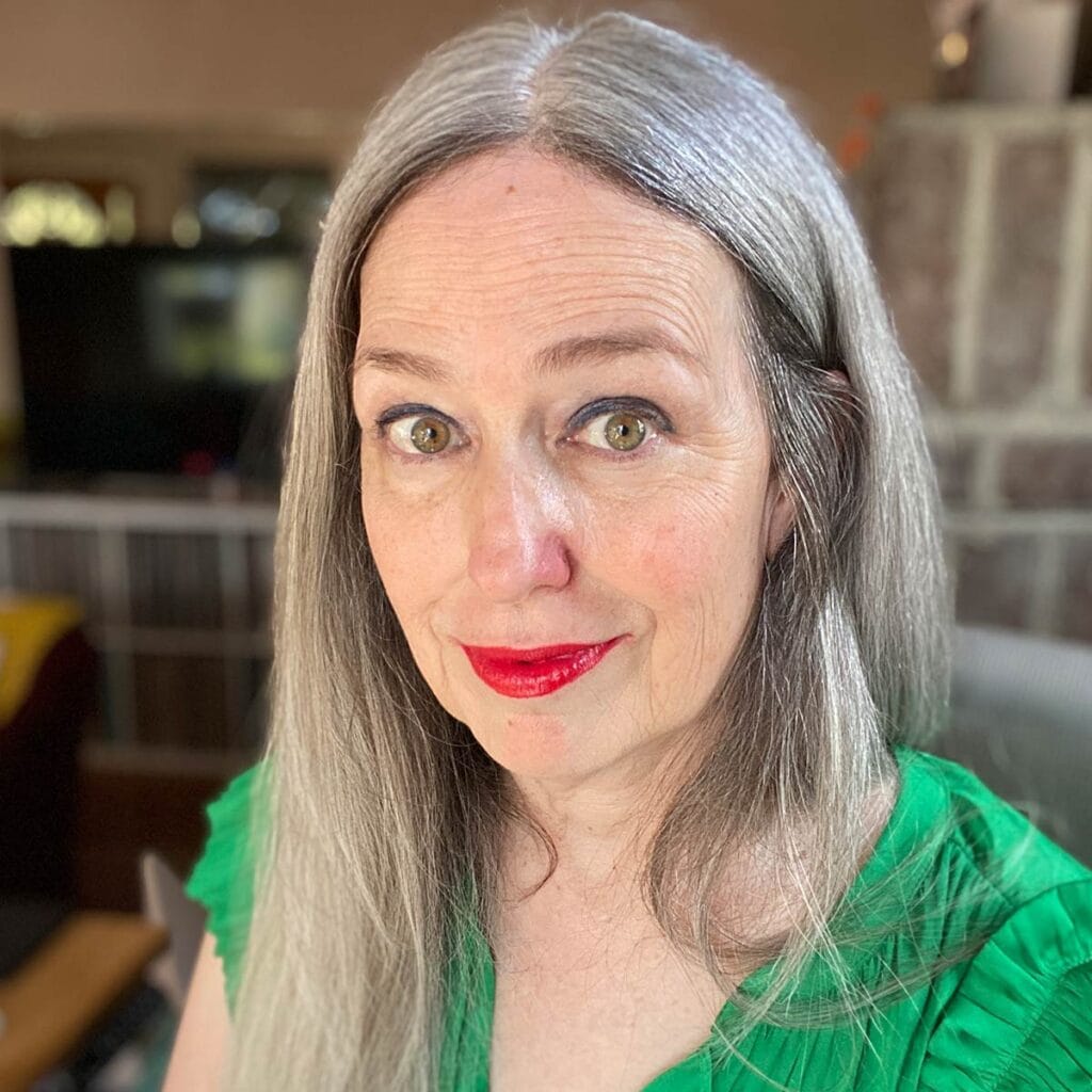 image of katie in bright green shirt
