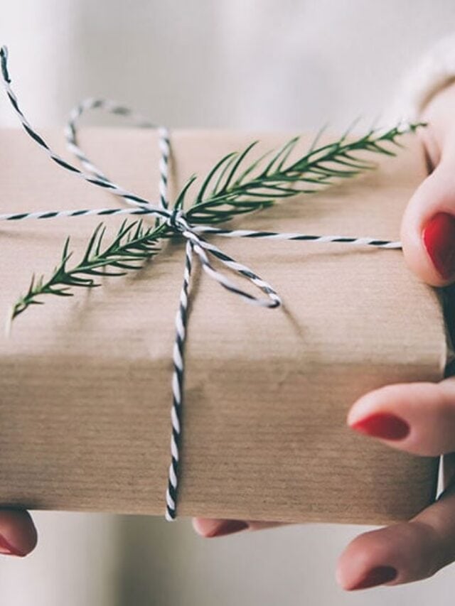 image of woman holding gifts
