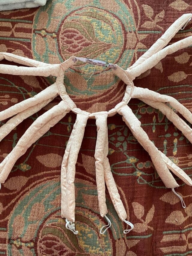 image of the Octocurl heatless curler on a bedspread