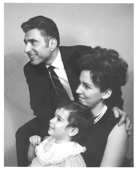 1960s photo of the author (2 years old) with her Mom and Stepfather.