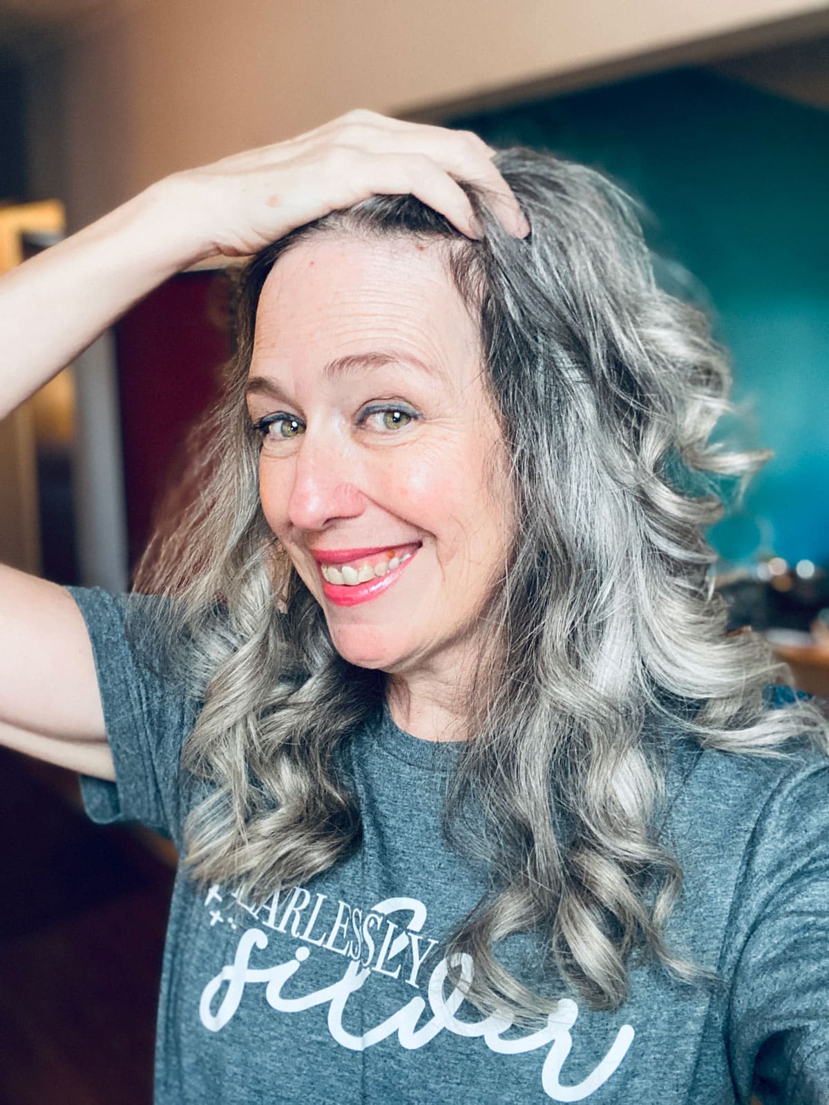 image of katie with long gray curls