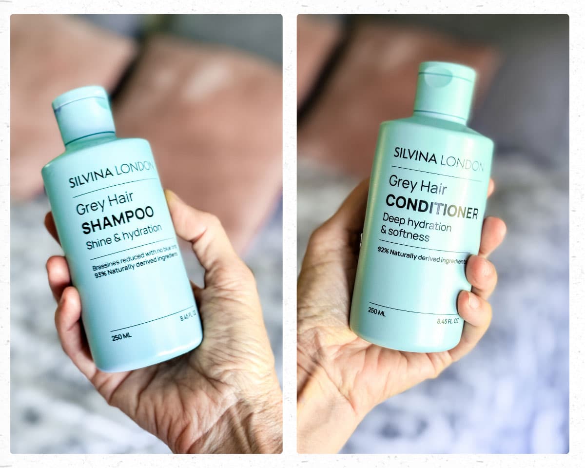 a woman's hand holding up bottles of silvina london shampoo and conditioner