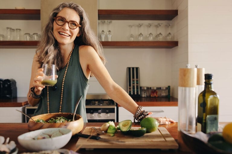 image of vibrant mature woman gray hair eating healthy food