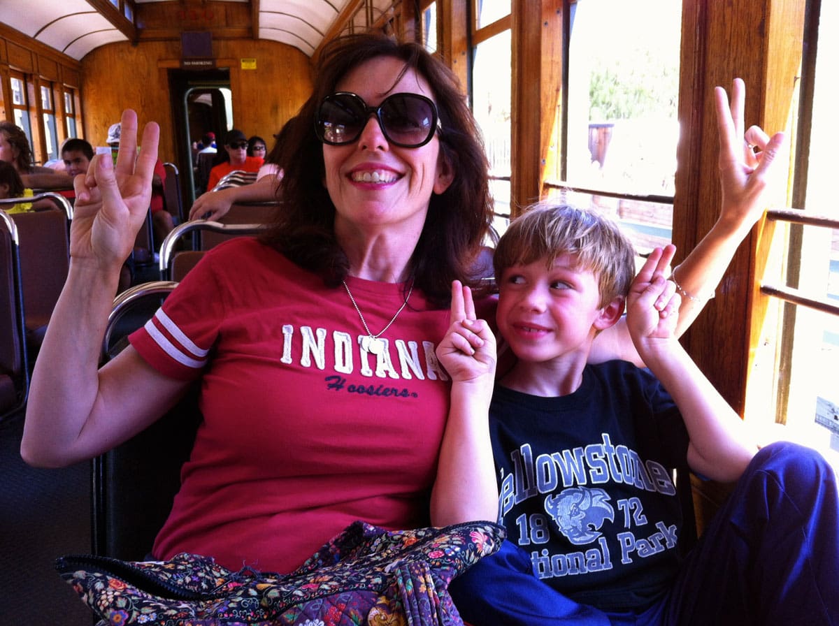 image of katie with dyed hair and young son