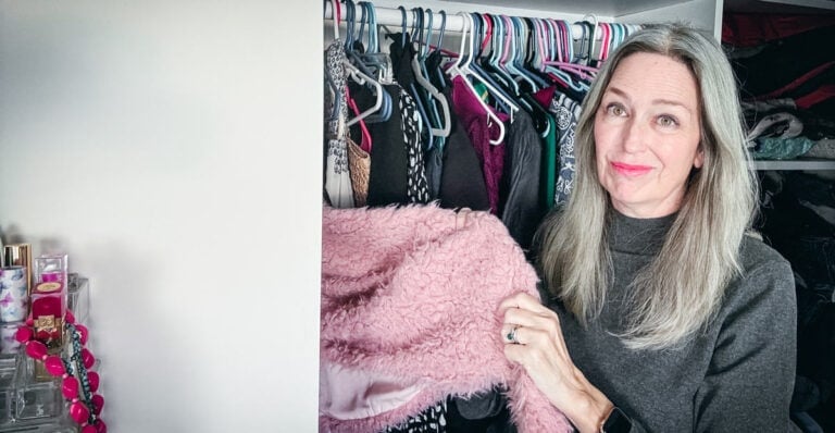 image of katie looking disappointed at the contents of her closet