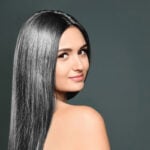 image of young woman with long gray hair