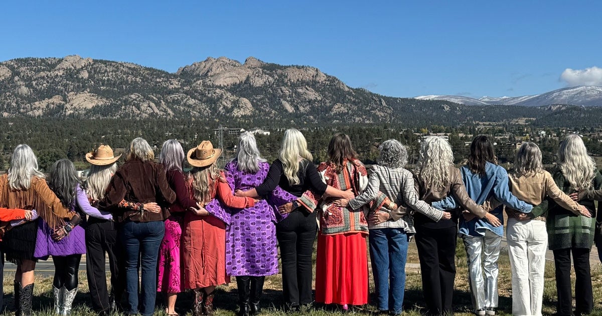 image of a large group of women with gray hair with their backs to the camera